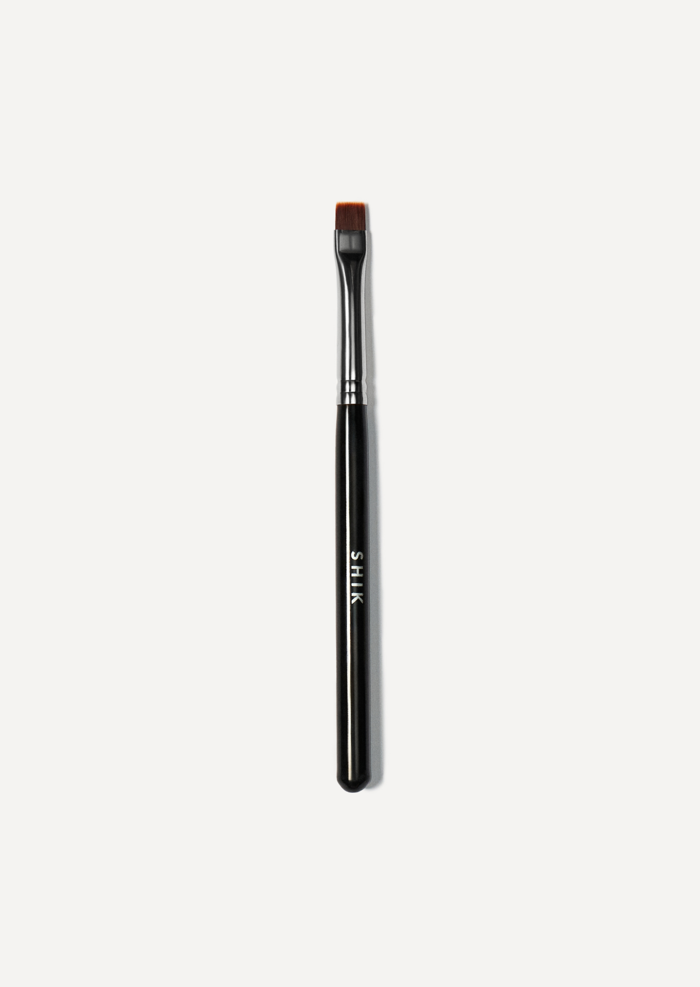 Eyebrow brush