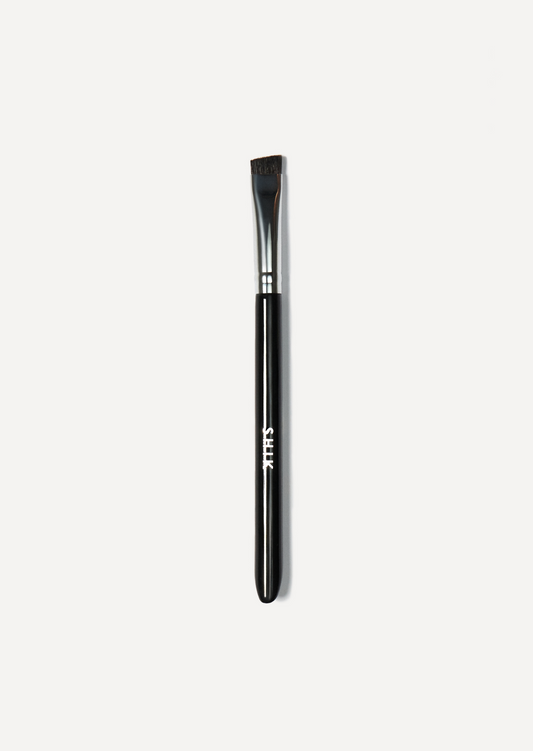 Eyebrow brush